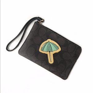 NWT Coach Signature Print Beach Wristlet